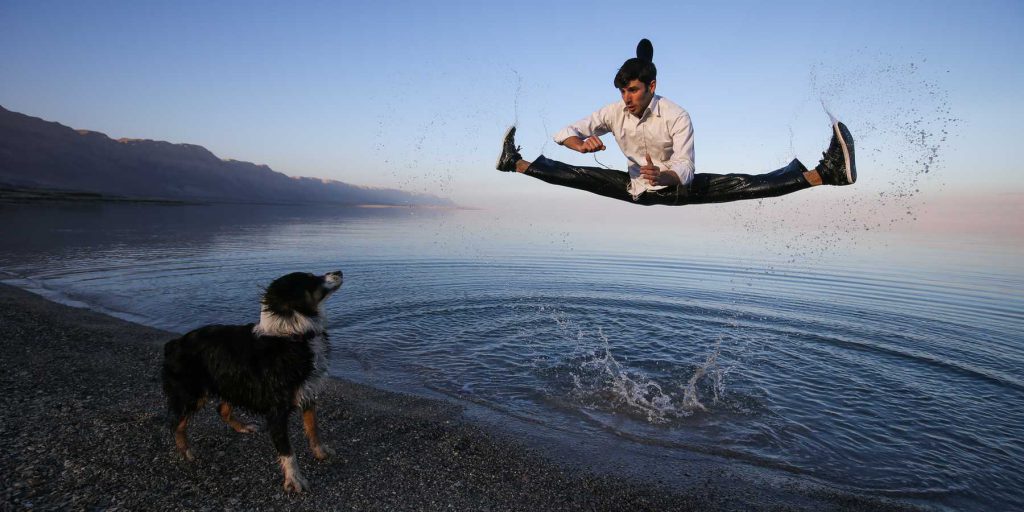 Ultra Orthodox Jewish brothers Mickey and Yehuda Hayat practice Capoeira, a Brazilian martial art that combines elements of dance, acrobatics and music, together with their students, during a training session by the Dead Sea on February 01, 2015. The Hayat brothers belong to the Abada Capoeira training group and teach over 200 students in his Dojo (training room) while seeking to promote martial arts in the ultra orthodox sector in Israel. Photo by Nati Shohat/Flash 90  *** Local Caption *** ÷ôåàøä çøãéí çøãé îé÷é   çééè   éí äîìç