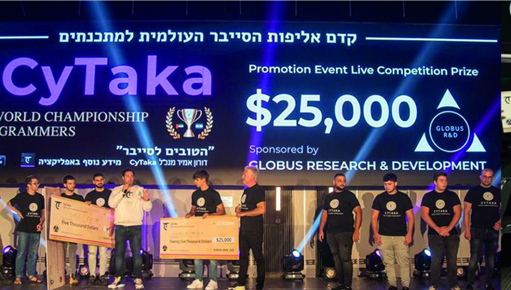Doron Amir and the winners of the CyTaka cyber competitions for programmers | Photos: Courtesy of Shimon Glianschpiegel and Hadar Yoavian
