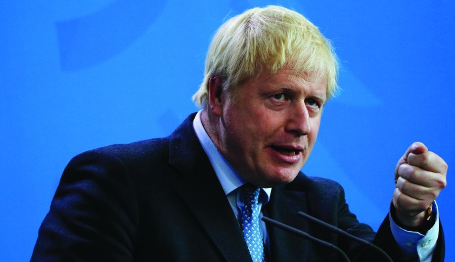 ראש ממשלת בריטניה, ג'ונסון. איים להטיל על הקבוצות "פצצה חקיקתית". צילום: shutterstock